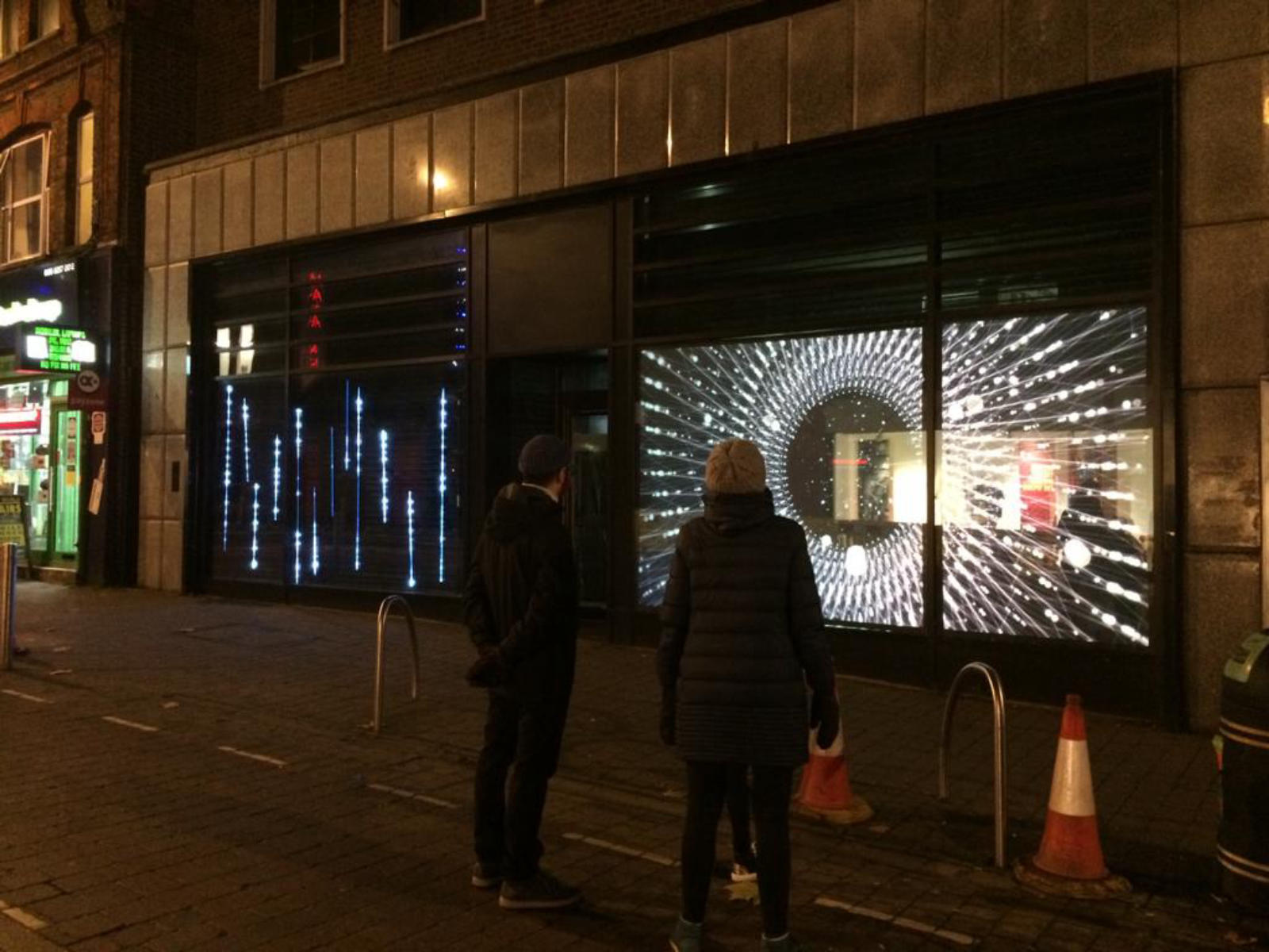 Projections on a street window Insight Lighting Ltd - London 